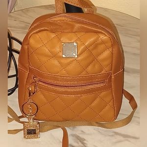 (Brown) Faux-leather Argyle quilted mini- backpack purse